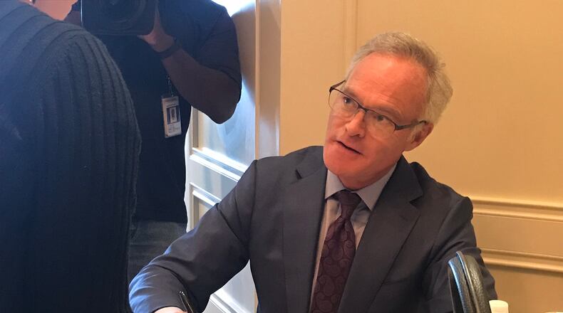 Scott Pelley signing his memoir "Truth Worth Telling" before an Atlanta Press Club newsmakers luncheon May 23, 2019.