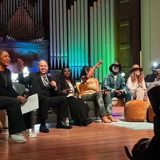 Cast members from the "A Different World" visited Morehouse College and other historically Black colleges and universities in Atlanta in February 2024. Holding the microphone is Darryl M. Bell, who played student Ron Johnson at Hillman College, a fictional HBCU. (Auzzy Byrdsell/AJC)