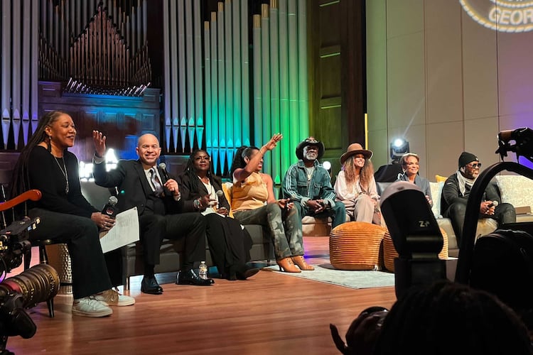 Cast members from the "A Different World" visited Morehouse College and other historically Black colleges and universities in Atlanta in February 2024. Holding the microphone is Darryl M. Bell, who played student Ron Johnson at Hillman College, a fictional HBCU. (Auzzy Byrdsell/AJC)