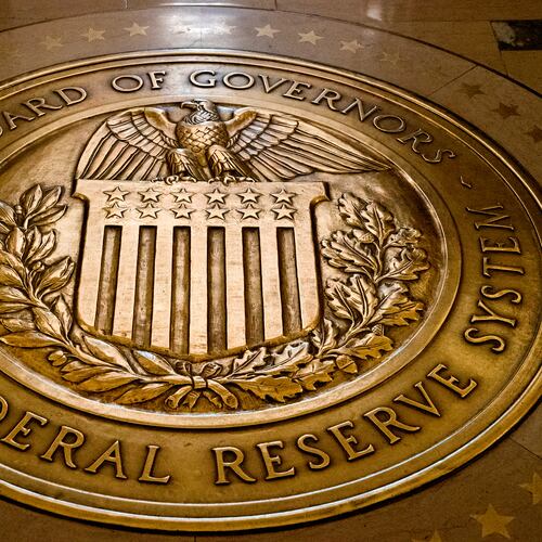 FILE- In this Feb. 5, 2018, file photo, the seal of the Board of Governors of the United States Federal Reserve System is displayed in the ground at the Marriner S. Eccles Federal Reserve Board Building in Washington. (AP Photo/Andrew Harnik, File)