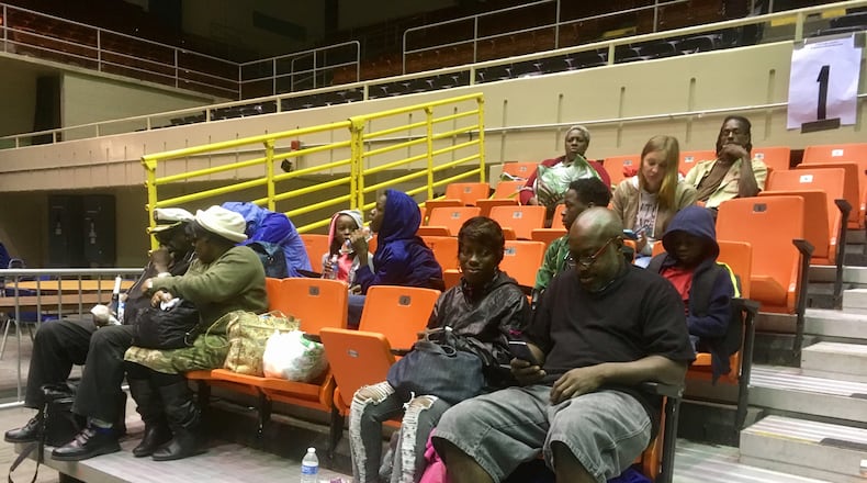 Gloria Hayes and Demetri White, front right, are among the last groups of people being bused out of Savannah ahead of Hurricane Irma. Photo: Jennifer Brett