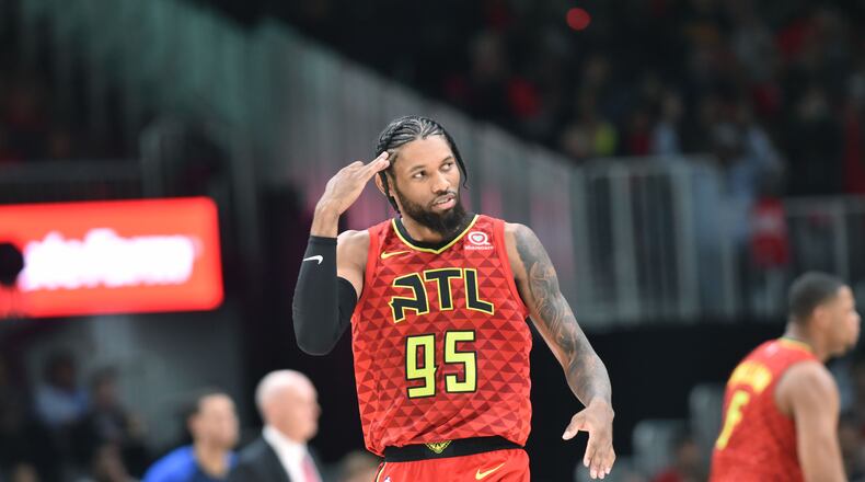 Atlanta Hawks forward DeAndre' Bembry (95) reacts after he scored during the second half of the home opener in an NBA basketball game at State Farm Arena on Wednesday, October 24, 2018. HYOSUB SHIN / HSHIN@AJC.COM