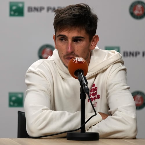 Italy's Matteo Arnaldi holds a press conference after witdrowing from a semifinal match due to an injury at the French Open in Paris, Friday, June 5, 2026. (AP Photo/Thibault Camus)