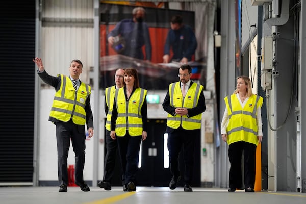 Britain's Chancellor of the Exchequer Rachel Reeves, center, visits Rheinmetall BAE Systems Land (RBSL) in Telford, England, Monday March 24, 2025. (Jacob King/Pool via AP)