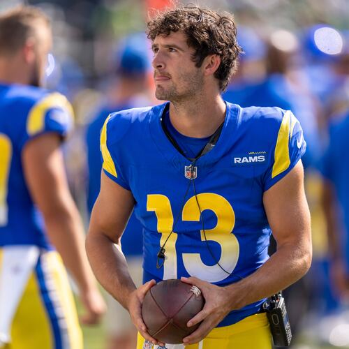 Rams quarterback Stetson Bennett is impressing coach Sean McVay in preseason camp, leading some to think the team might carry three quarterbacks on its roster this season. (AP file photo)