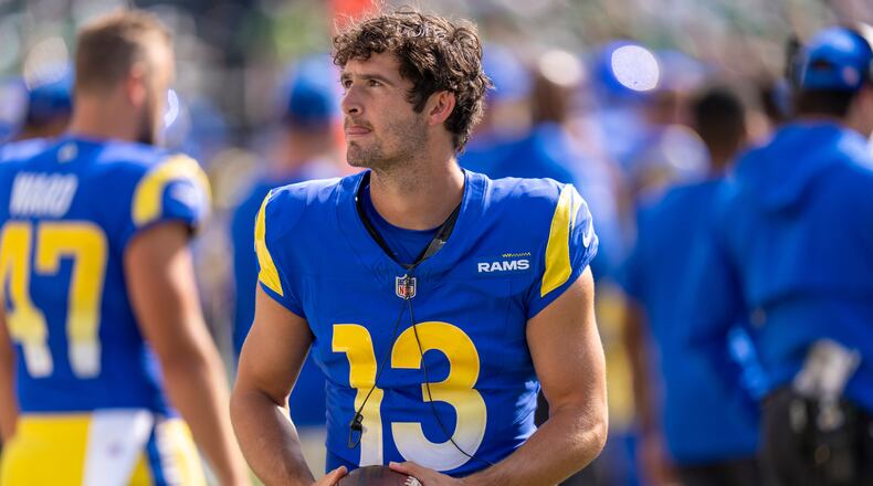 Rams quarterback Stetson Bennett is impressing coach Sean McVay in preseason camp, leading some to think the team might carry three quarterbacks on its roster this season. (AP file photo)