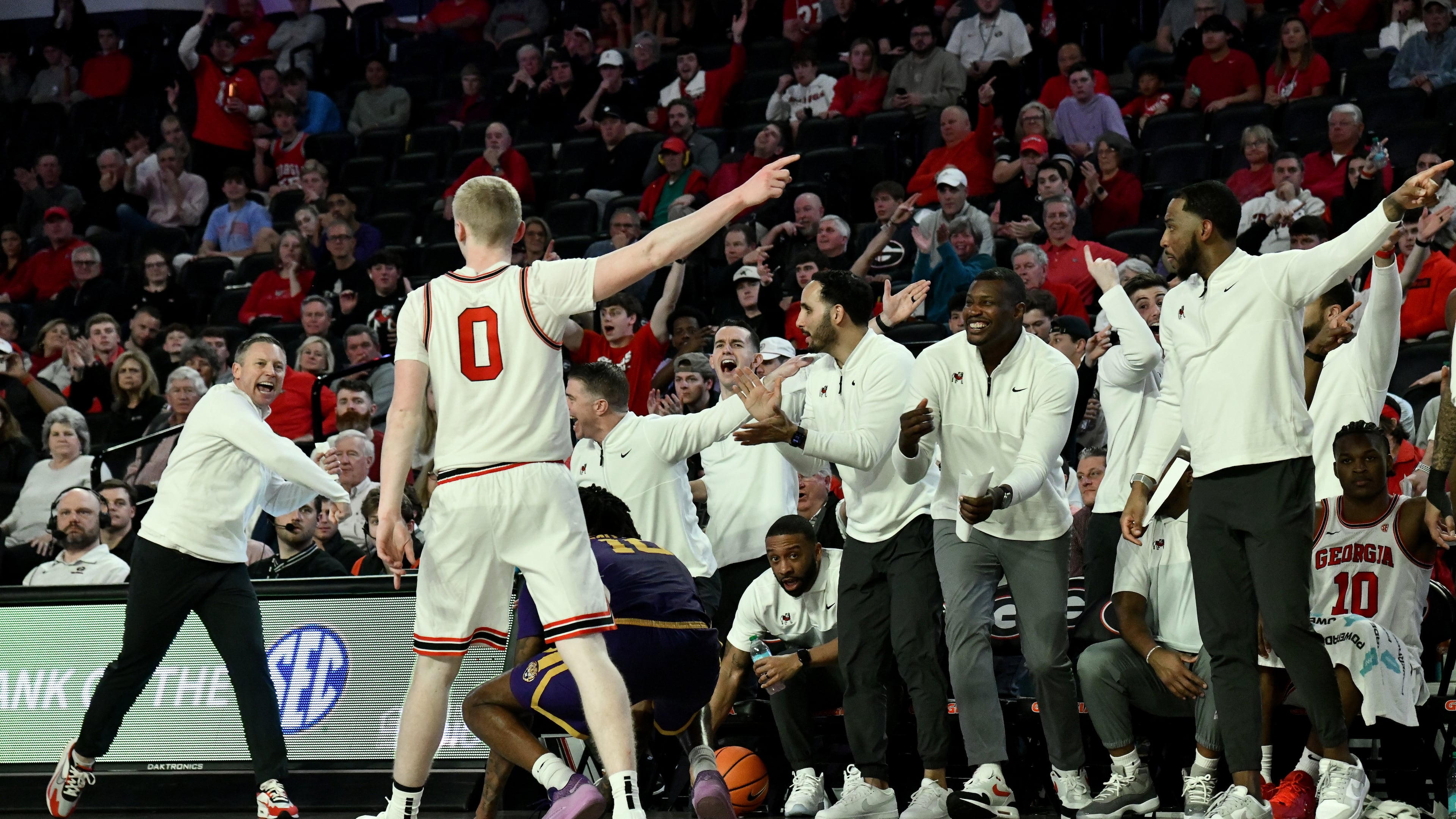 Georgia head coach Mike White (left) and coaching staff react during the second half of an NCAA college basketball game at Stegeman Coliseum, Wednesday, February 5, 2025, in Athens. Georgia won 81-62 over LSU. (Hyosub Shin/AJC)
