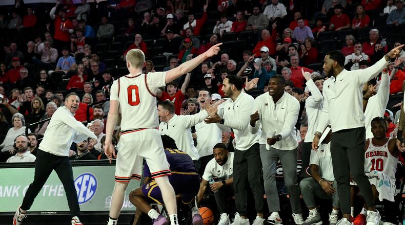 Georgia head coach Mike White (left) and coaching staff react during the second half of an NCAA college basketball game at Stegeman Coliseum, Wednesday, February 5, 2025, in Athens. Georgia won 81-62 over LSU. (Hyosub Shin / AJC)