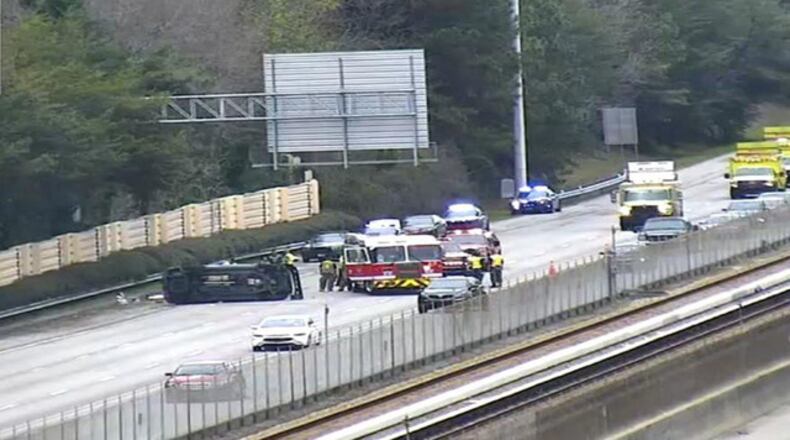 Several lanes of southbound GA 400 were shut down Wednesday because a fatal wreck.