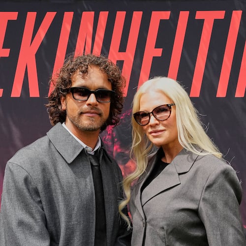 Linda Lampenius and Pete Parkkonen, who compete as Liekinheitin for Finland at the 70th Eurovision Song Contest, watch the camera after an interview with The Associated Press in Vienna, Austria, Thursday, May 14, 2026. (AP Photo/Martin Meissner)