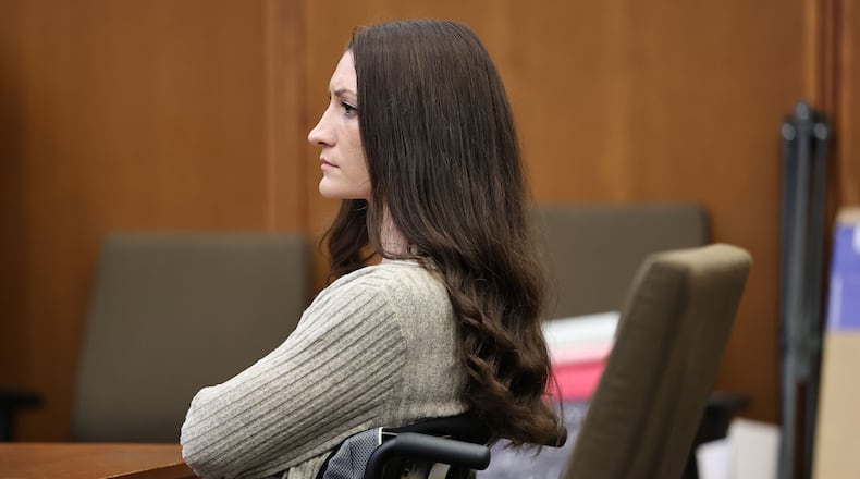 Lyndsay Clancy listens to the testimony of Dr. Gregory Saathoff during her murder trial in Plymouth Superior Court on Wednesday, Aug. 26, 2026 in Plymouth, Mass. (Greg Derr/The Patriot Ledger via AP, Pool)