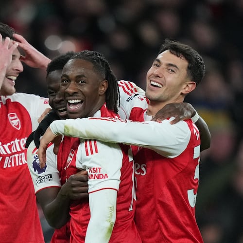 Arsenal's Eberechi Eze , centerm smiles after scoring during a Premier League soccer match between Arsenal and Tottenham in London, Sunday, Nov. 23, 2025. (AP Photo/Frank Augstein)