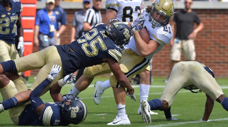 September 23, 2017 Atlanta - Georgia Tech running back Quaide Weimerskirch (21) dives into the endzone for a touchdown in the second half of an NCAA college football game at Bobby Dodd Stadium on Saturday, September 23, 2017. Georgia Tech won 35 - 17 over the Pittsburgh. HYOSUB SHIN / HSHIN@AJC.COM