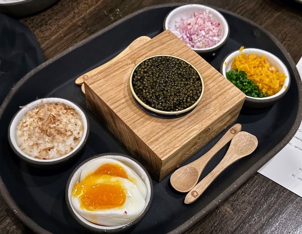 Excellent osetra caviar at Fawn Wine & Amaro is paired with root vegetables, such as salsify, and a radish puree. (Henri Hollis/AJC)