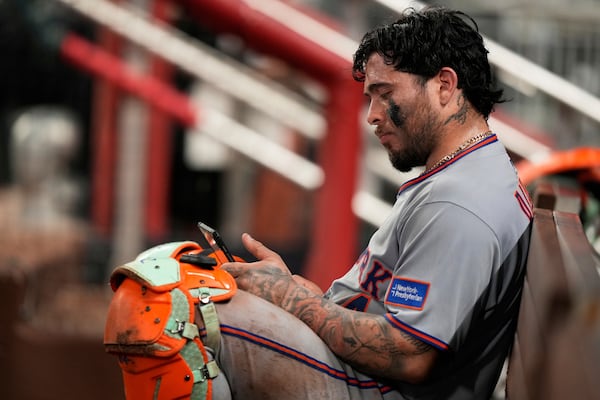 Mets catcher Francisco Alvarez sulks in the dugout after the Braves' walk-off win. 