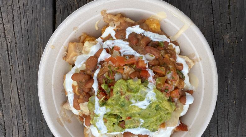 The Queso Shop’s loaded tots are a great and filling $8 meal; these are made with pork belly.
Wendell Brock for The Atlanta Journal-Constitution