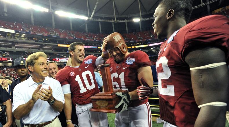 Hyosub Shin captured this image of Nick Saban celebrating with his team after its win over Virginia Tech at the Georgia Dome in 2013.