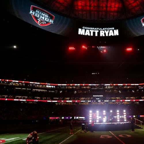 Former Atlanta Falcons quarterback Matt Ryan is inducted into the Falcons' Ring of Honor during an NFL football game against the Tampa Bay Buccaneers Thursday, Oct. 3, 2024, in Atlanta. (AP Photo/Butch Dill)