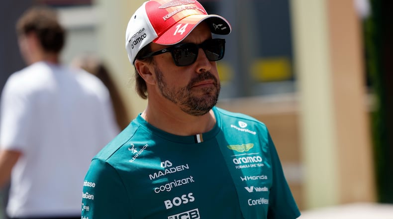 Aston Martin driver Fernando Alonso of Spain, walks at the Barcelona Catalunya racetrack in Montmelo, near Barcelona, Spain, Thursday, June 11, 2026. (AP Photo/ Joan Monfort)