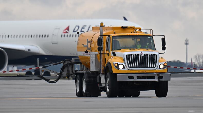 De-icing crews demonstrate their equipment as they prepare for this weekend’s winter weather event at Hartsfield-Jackson Atlanta International Airport’s South Deicing Facility on Friday, Jan. 23, 2026. Airport officials say millions of dollars worth of new equipment leave it better prepared for the impending ice storm. (Hyosub Shin/AJC)