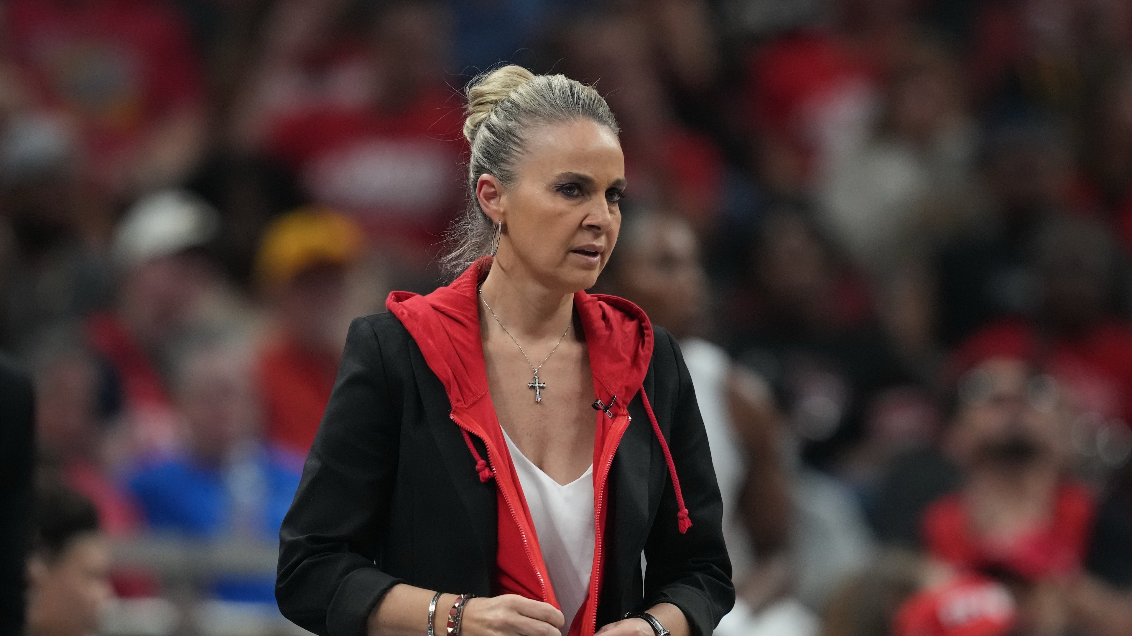 Las Vegas Aces head coach Becky Hammon watches during first half of Game 3 of a WNBA basketball playoff semifinals series against the Indiana Fever, Friday, Sept. 26, 2025, in Indianapolis. (AP Photo/Darron Cummings)