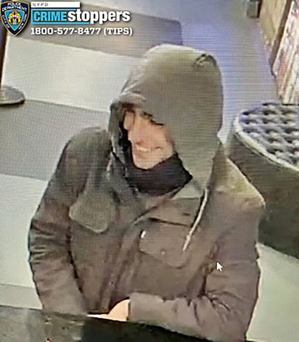 Police released this image of the suspected shooter in the slaying of UnitedHeathcare CEO Brian Thompson.