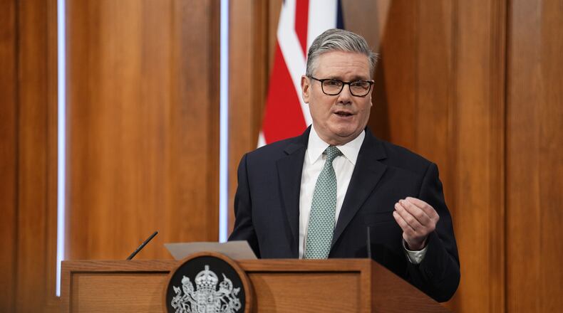 Britain's Prime Minister Keir Starmer delivers a statement in the media briefing room of 9 Downing Street, in central London, Monday, Jan. 19, 2026. (Jordan Pettitt/Pool Photo via AP)
