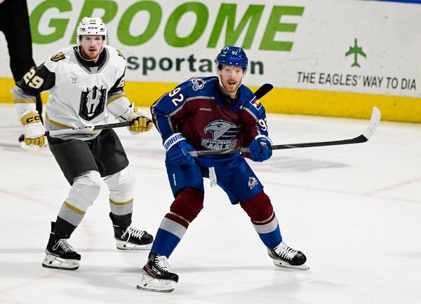 Colorado Eagles forward Gabriel Landeskog, right, is trailed by Henderson Silver Knights defenseman Lucas Johansen in the second period of a minor league hockey game Friday, April 11, 2025, in Loveland, Colo. (Andy Cross/The Denver Post via AP)