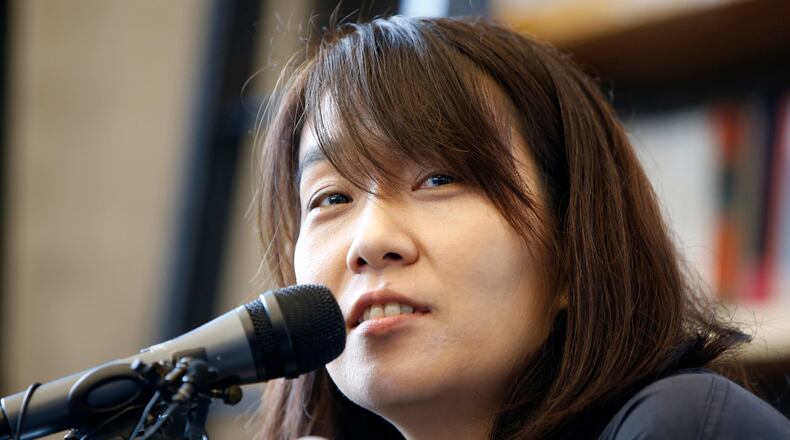 FILE - South Korean author Han Kang speaks to the media during a news conference in Seoul, South Korea, on May 24, 2016. (AP Photo/Lee Jin-man, File)