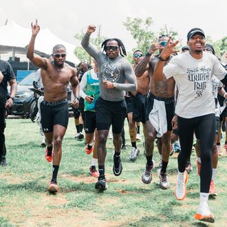 In 2025, while touring with his album "The Last Wun," Gunna (center, wearing glasses and gray shirt) began his Wunna Run Club in various cities across the globe. (Courtesy of Desmond Kye)