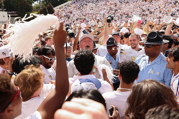 Georgia Tech football coach Brent Key (center) had a blast after beating Clemson.