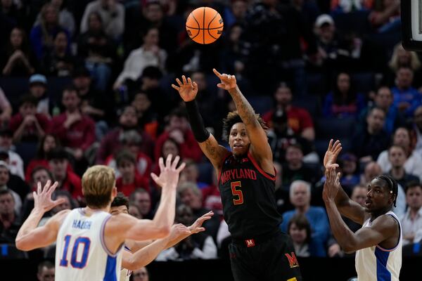 Maryland guard DeShawn Harris-Smith (5) passes during the first half in the Sweet 16 of the NCAA college basketball tournament against Florida, Thursday, March 27, 2025, in San Francisco. (AP Photo/Godofredo A. Vásquez)