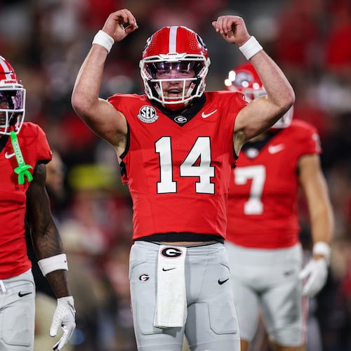 Georgia quarterback Gunner Stockton (14) reacts during pregame warmups before the start of an NCAA college football game against Texas, Saturday, Nov. 15, 2025, in Athens, Ga. (AP Photo/Colin Hubbard)