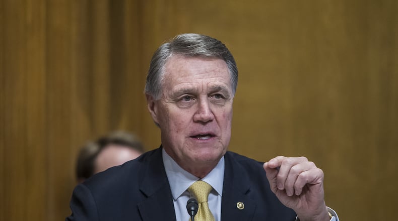 Georgia U.S. Sen. David Perdue questions Secretary of State Mike Pompeo during a hearing on June 11, 2019. (Photo by Zach Gibson/Getty Images)