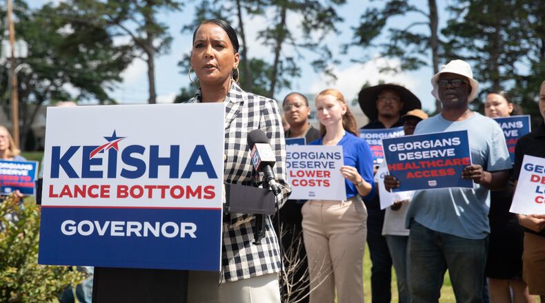 Former Atlanta mayor and Democratic nominee for governor Keisha Lance Bottoms campaigns outside of a shuttered rural hospital in Commerce, Georgia, on June 17, 2026. (Riley Bunch/AJC)