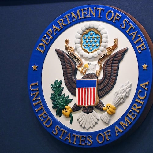 FILE - The State Department seal is seen on the briefing room lectern at the State Department in Washington, Jan. 31, 2022. (Mandel Ngan, Pool via AP, File)