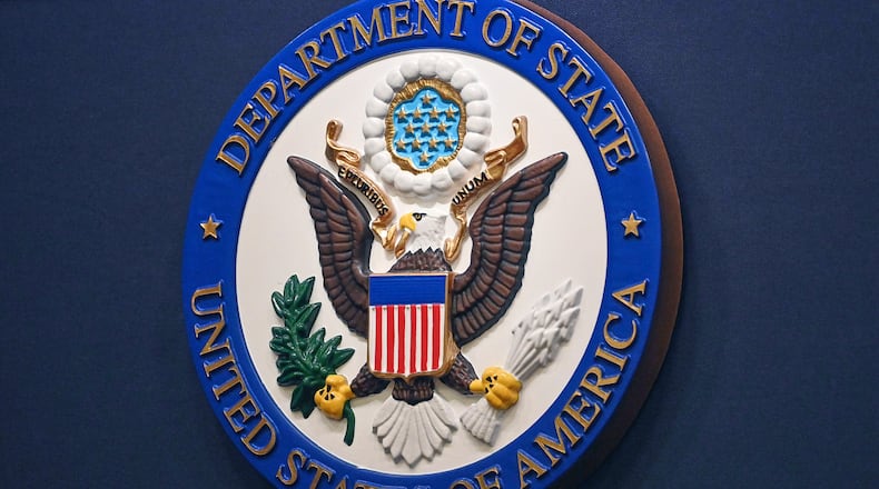FILE - The State Department seal is seen on the briefing room lectern at the State Department in Washington, Jan. 31, 2022. (Mandel Ngan, Pool via AP, File)
