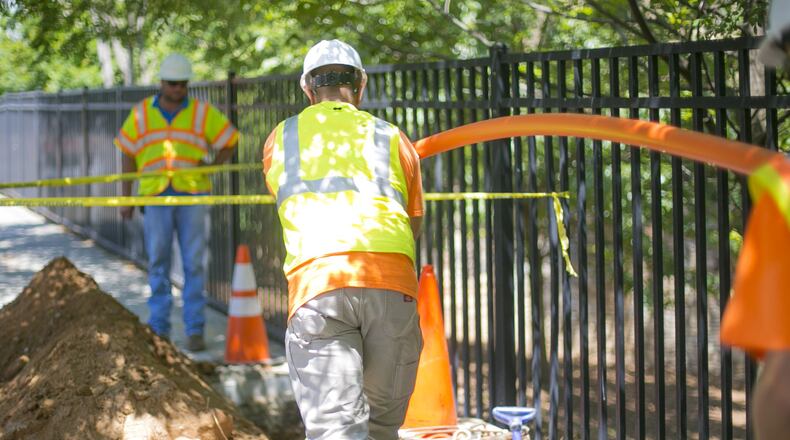 Contractors for Google work on installing fiber lines. The search engine giant plans to offer its Google Fiber 1-gig service in several metro Atlanta communities, including Smyrna, College Park, Atlanta and Avondale Estates.