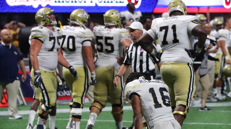 Georgia Tech quarterback TaQuon Marshall takes a moment to process 42-41 overtime loss to Tennessee. (Curtis Compton/ccompton@ajc.com)