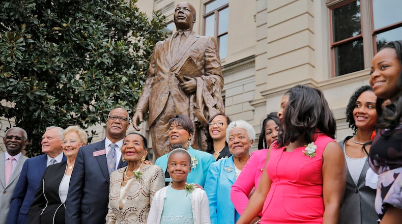 8/26/17 - Atlanta, GA - Georgia leaders, including Gov. Nathan Deal, Sandra Deal, members of the King family, and Rep. Calvin Smyre, were on hand for unveiling of the first statue of Martin Luther King Jr. on Monday at the statehouse grounds, more than three years after Gov. Nathan Deal first announced the project. During the hour-long ceremony leading to the unveiling of the statue of Martin Luther King Jr. at the state Capitol on Monday, many speakers, including Gov. Nathan Deal, spoke of King's biography. The statue was unveiled on the anniversary of King's famed "I Have Dream" speech. BOB ANDRES /BANDRES@AJC.COM