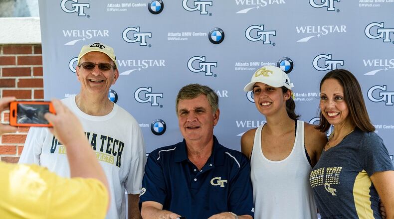 Yellow Jackets fans pose for a photo with Georgia Tech football coach Paul Johnson during Tech's Fan Day on Aug. 12, 1007 at Bobby Dodd Stadium. -- Danny Karnik/GT Athletics