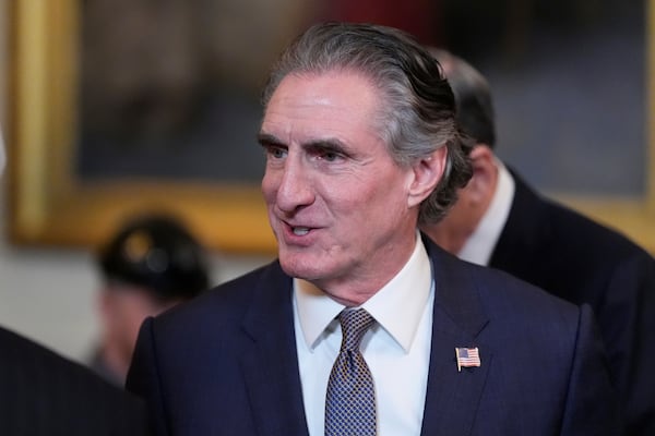 FILE - Interior Secretary Doug Burgum arrives before President Donald Trump speaks during an executive order signing event in the East Room of the White House, Tuesday, April 8, 2025, in Washington. (AP Photo/Alex Brandon,File)