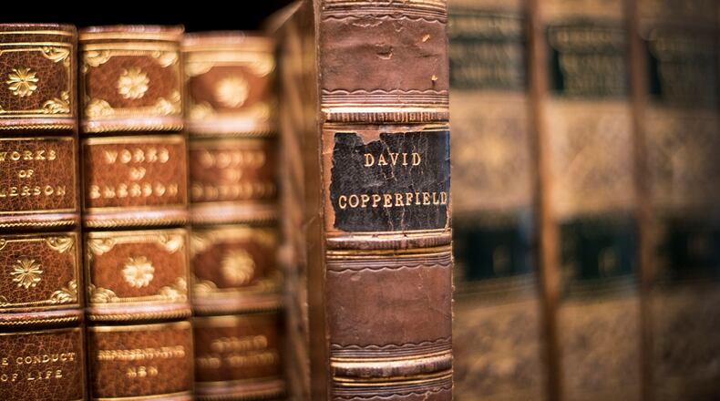 A senior and the salutatorian at the Gwinnett School of Mathematics, Science, and Technology says schools should update reading lists to include more current books of interest to teens.