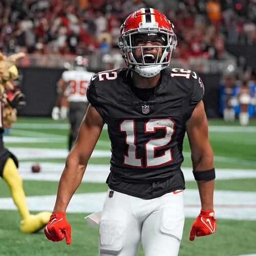 KhaDarel Hodge (center) and the Atlanta Falcons celebrated two wins over the Buccaneers last season — one on Oct. 4 when Hodge scored the game-winning touchdown in overtime in Atlanta (pictured) and the second one Oct. 27 in Tampa, Florida. The Falcons and Bucs open the 2025 NFL season on Sept. 7 at Mercedes-Benz Stadium. (John Bazemore/AP 2024)