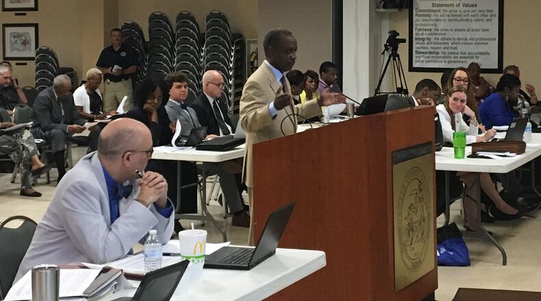 DeKalb County CEO Mike Thurmond, along with Budget Director Jay Vinicki, left, gave an overview of his budget priorities to the DeKalb Commission on June 6, 2017. MARK NIESSE / MARK.NIESSE@AJC.COM