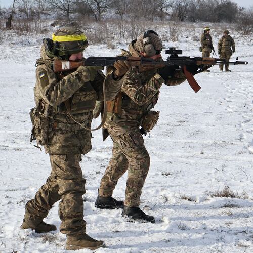 CORRECTS DATE In this photo provided by Ukraine's 65th Mechanized Brigade press service, recruits perform drills at a training ground in the Zaporizhzhia region, Ukraine, Tuesday, Jan. 20, 2026. (Andriy Andriyenko/Ukraine's 65th Mechanized Brigade via AP)
