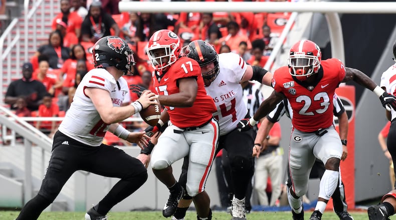 Georgia linebacker Nakobe Dean (17) Georgia defensive back Mark Webb (23) Athens, GA - The #3-ranked University of Georgia football team defeated ArkansasState, 55-0, in a game played on Dooley Field at Sanford Stadium. Photo credit, Perry McIntyre.