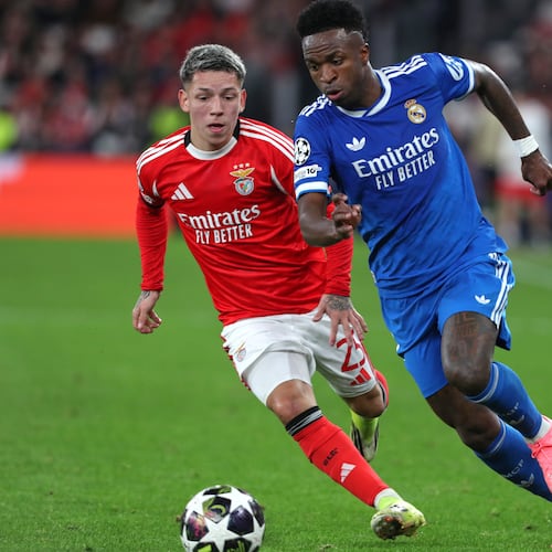 FILE - Benfica's Gianluca Prestianni fights for the ball against Real Madrid's Vinicius Junior during a Champions League playoff soccer match between SL Benfica and Real Madrid in Lisbon, Portugal, Tuesday, Feb. 17, 2026. (AP Photo/Pedro Rocha, File)