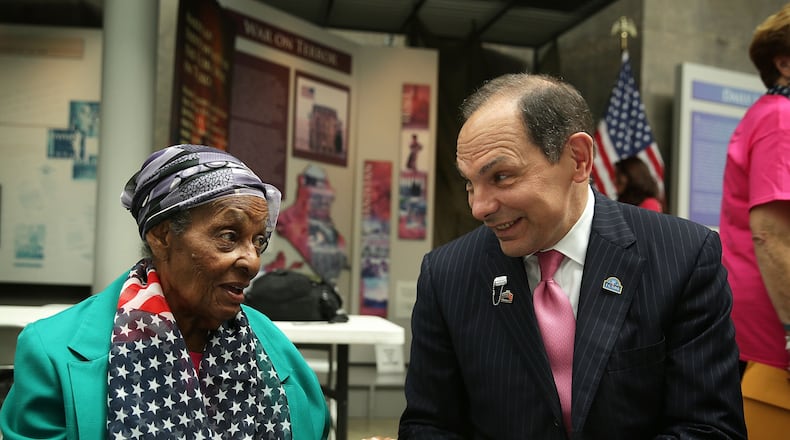 A supplies drive for female veterans in need is taking place through Sept. 17 by the Honorary Commanders of Cobb County. In 2015, U.S. Veterans Affairs Secretary Robert McDonald talks to World War II veteran Rosa Moore of Cincinnati, Ohio, the oldest participant of the first-ever all female Honor Flight to Washington, DC. (Photo by Alex Wong/Getty Images)