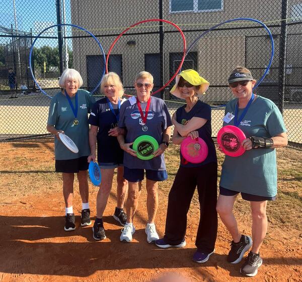 Gladys Mixon stands among her competitors in the Frisbee event. The Golden Games provide a variety of activities for older adults of all physical abilities and fitness levels. (Courtesy of Gladys Mixon)